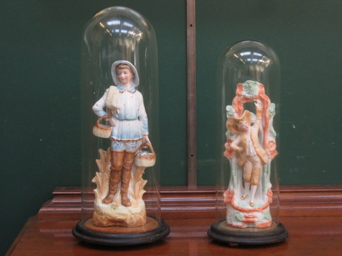 UNGLAZED CONTINENTAL STYLE CERAMIC FIGURES UNDER VICTORIAN GLASS DOME