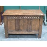 OAK LINEN FOLD FRONTED SMALL BLANKET CHEST.