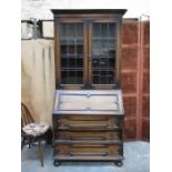 OAK TWO DOOR GLAZED BUREAU BOOKCASE