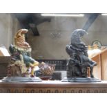 TWO CAST METAL MR PUNCH DOOR STOPS