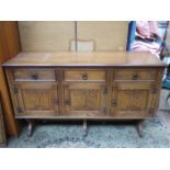 PRIORY STYLE OAK THREE DRAWER SIDEBOARD