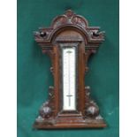 CARVED OAK CASED THERMOMETER