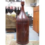 MALAYSIAN CARVED AND BRASS INLAID BOTTLE FORM DRINKS CABINET