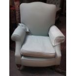 UPHOLSTERED LOW SEATED ARMCHAIR