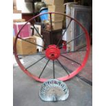 PAINTED CAST METAL WAGON WHEEL AND TRACTOR SEAT