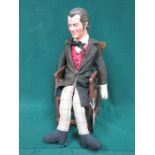 SEATED DOLL DEPICTING REX HARRISON AS DR DOLITTLE FROM THE 1960s FILM