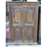 CARVED FRONTED MALAYSIAN STYLE TWO DOOR CUPBOARD