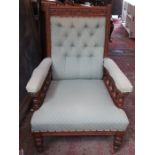 UPHOLSTERED LOW SEATED ARMCHAIR