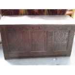 HEAVILY CARVED OAK BLANKET CHEST