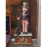 PAINTED CAST METAL CHARACTER FORM MONEY BOX DEPICTING UNCLE SAM