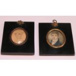 TWO EARLY 19th CENTURY OVAL MINIATURE PORTRAITS IN EBONISED FRAMES