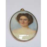 OVAL MINIATURE PORTRAIT OF A 19th CENTURY LADY