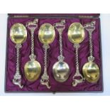 CASED SET OF SIX CONTINENTAL HALLMARKED SILVER GILT PRESENTATION SPOONS