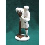 ROYAL DOULTON GLAZED CERAMIC FIGURE - THE WIGMAKER OF WILLIAMSBURG.