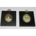 TWO EARLY 19th CENTURY OVAL MINIATURE PORTRAITS IN EBONISED FRAMES