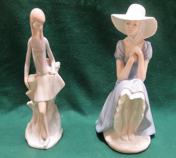 TWO NAO GLAZED CERAMIC FIGURES,