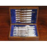 OAK CASED SET OF SIX SILVER BANDED FISH KNIVES AND FORKS