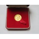 CASED GEORGE V HALF SOVEREIGN