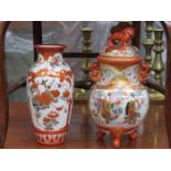 TWO SIMILAR HANDPAINTED AND GILDED ORIENTAL CERAMIC VASES,