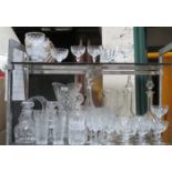 LARGE QUANTITY OF VARIOUS GLASSWARE INCLUDING THREE WATERFORD CRYSTAL TUMBLERS, VARIOUS DECANTERS,