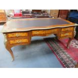 REPRODUCTION FRENCH STYLE ORMOLU MOUNTED FIVE DRAWER WRITING DESK WITH LEATHER INSERT