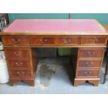 LEATHER TOPPED PEDESTAL WRITING DESK