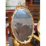 GILDED OVAL WALL MIRROR