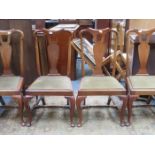 SET OF FOUR MAHOGANY DINING CHAIRS ON STRETCHED SUPPORTS