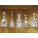 FIVE VARIOUS GLASS DECANTERS,