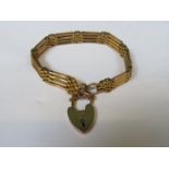 9ct GOLD GATE BRACELET WITH HEART CLASP