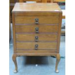 MAHOGANY FOUR DRAWER MUSIC CABINET AND CONTENTS