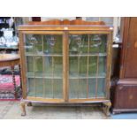 BOW FRONTED MAHOGANY TWO DOOR DISPLAY CABINET