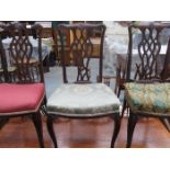 SET OF THREE MAHOGANY PIERCEWORK BACKED BEDROOM CHAIRS