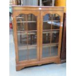 WALNUT VENEERED TWO DOOR DISPLAY CABINET