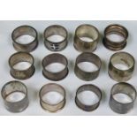 TWELVE VARIOUS HALLMARKED SILVER NAPKIN RINGS