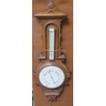 CARVED OAK CASED ANEROID BAROMETER