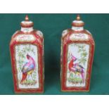 PAIR OF HANDPAINTED AND GILDED ORIENTAL STYLE CERAMIC STORAGE VESSELS WITH COVERS,