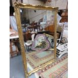 LARGE GILDED AND BEVELLED WALL MIRROR,