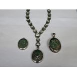 THREE VARIOUS SILVER OVAL LOCKETS,