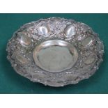 MIDDLE EASTERN REPOUSSE DECORATED SILVER COLOURED SHALLOW BOWL,