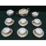 PRETTY ROYAL WORCESTER HANDPAINTED AND GILDED HEART FORM FIFTEEN PIECE TEA SET