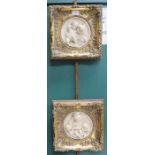 PAIR OF GILT FRAMED MARBLE EFFECT RELIEF DECORATED PLAQUES