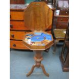 WALNUT VENEERED OCTAGONAL SEWING CABINET ON TRIPOD SUPPORTS