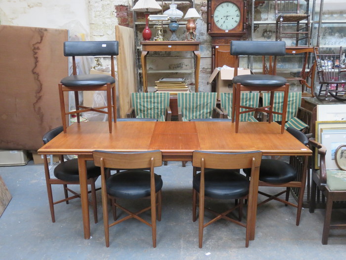 MCINTOSH 1970s STYLE TEAK EXTENDING TABLE WITH EIGHT CHAIRS