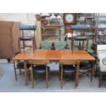 MCINTOSH 1970s STYLE TEAK EXTENDING TABLE WITH EIGHT CHAIRS