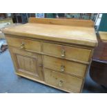 STRIPPED PINE KITCHEN CUPBOARD WITH FOUR DRAWERS