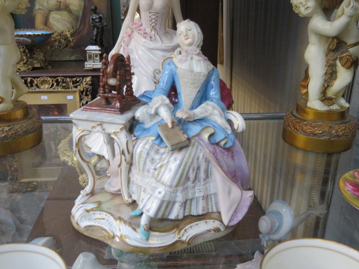 MEISSEN HANDPAINTED AND GILDED CERAMIC SEATED FIGURE
