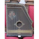 DECORATIVE EBONISED "GUITAR ZITHER" (AT FAULT)