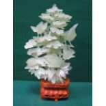 HEAVILY CARVED ORIENTAL STYLE JADE COLOURED TREE FORM FIGURE WITH MYTHICAL BIRDS ON WOODEN STAND,