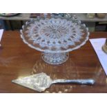 GLASS STEMMED CAKE STAND AND PLATED CAKE SLICE